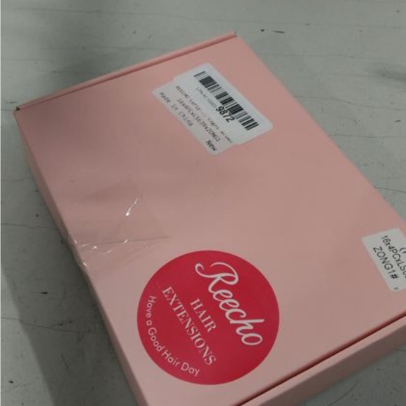 Echo Clip-In Curly Extensions in Light Brown with Subtle Highlights - Picture 5 of 5